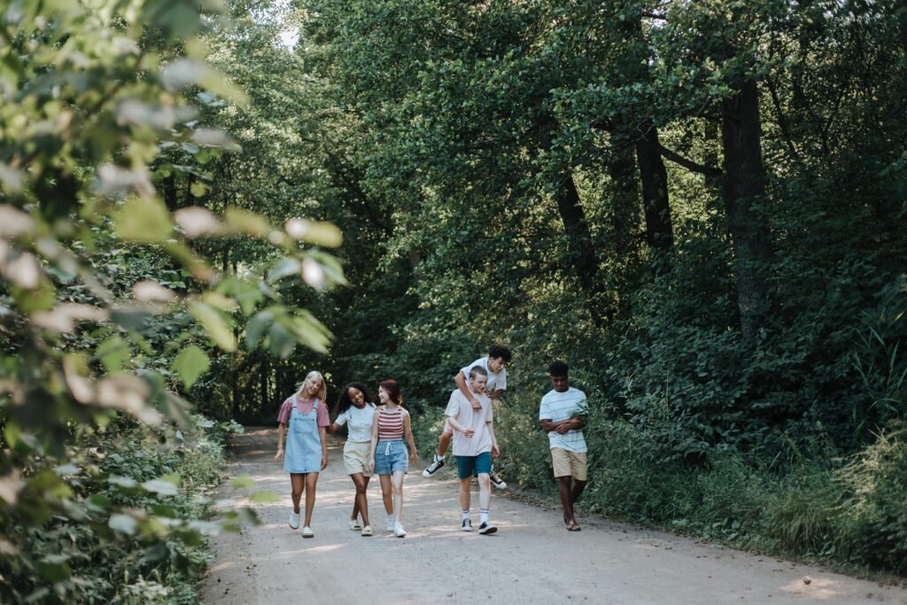 Group Walking in the woods on a rood